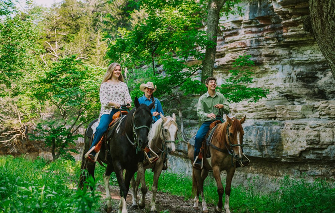 Horseback riding at Dogwood Canyon Nature Park.